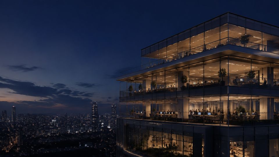 HATARIO key visual: an office building lit up at night